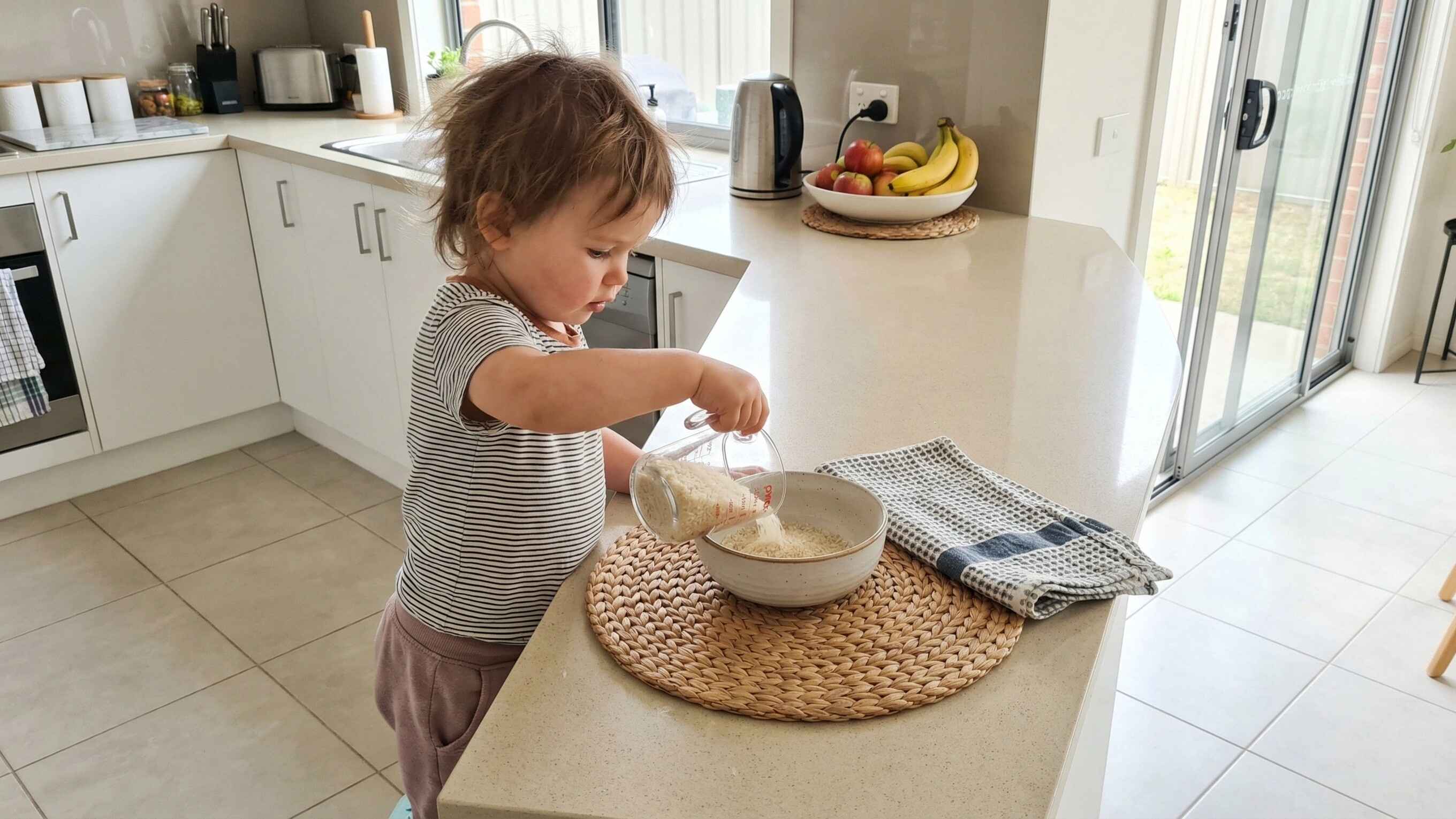 DIY Montessori Pouring Activities for Toddlers (Using Household Items)
